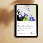 Auf einem Tablet ist das Titelbild des Whitepapers "Den digitalen Sozialstaat nutzendenorientiert gestalten" zu sehen, welches der DCV in Zusammenarbeit mit der Agora Digitale Transformation erarbeitet hat.
